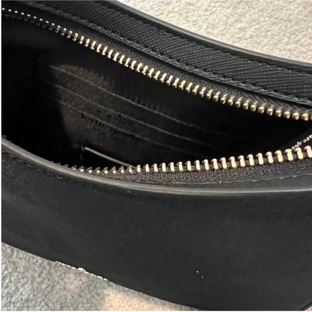 Kate Spade 8.4" × 8.8" × 1.6" Black
Shoulder Bag - Picture 12 of 12